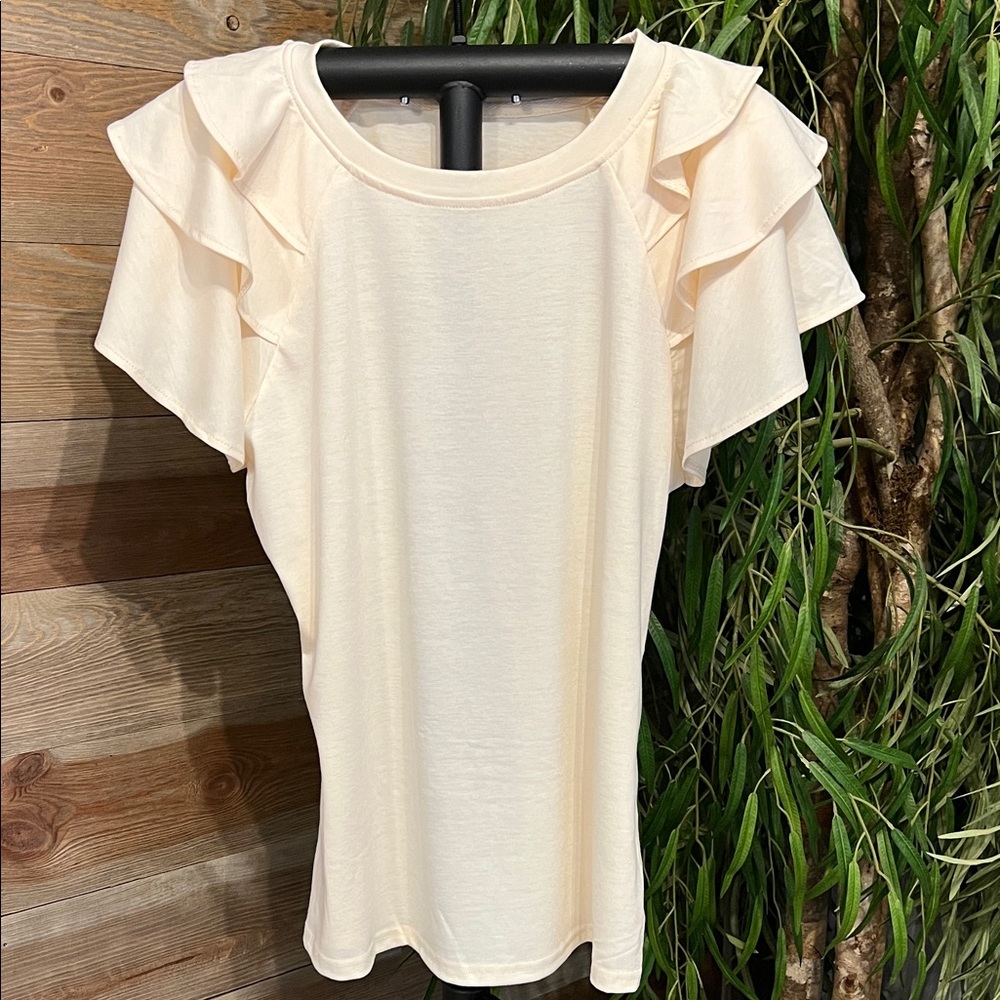Cream color ruffle sleeve t shirt top. Short sleeves. Large